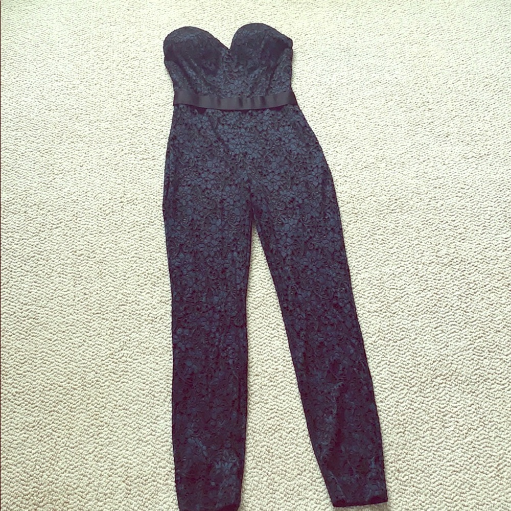 BEBE Navy and black lace jumpsuit